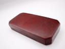 Exterior view of the red leatherette H. Samuel presentation box.