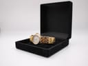 The Enzo Giovanni watch resting inside a generic black presentation box.