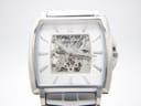 Close-up front view of the Kenneth Cole Reaction skeleton dial, showcasing the exposed mechanical movement.