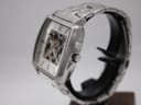Side quarter view of the watch, highlighting the stainless steel case and standard push/pull crown.