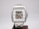 Full front view of the Kenneth Cole Reaction automatic skeleton watch, displaying the dial and bracelet.