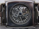 Close-up of the exhibition case back, revealing the intricate mechanical movement and 'WATER RESISTANT', 'ALL STAINLESS STEEL', 'KC3770', 'U54-07' engravings.