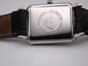 Close-up of the stainless steel case back of the Emporio Armani AR-0413, showing engravings for brand, model, and water resistance.