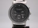 Close-up front view of the Rocha John Rocha watch dial, showing chronograph sub-dials, baton markers, and date window.
