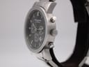 Side view of the Rocha John Rocha watch, highlighting the stainless steel case, crown, and chronograph pushers.