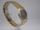 Side-angled view of the gold-tone Citizen Eco-Drive watch, showing the crystal bezel detail and integrated bracelet.