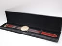 The Roamer watch nestled in an open black presentation box, showing the watch and strap clearly within the case.
