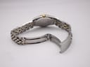 Rear view of the opened two-tone bracelet clasp, showing the stainless steel construction.
