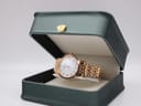 Bulova 97P106 watch presented inside a generic dark green watch box with a cream interior for display.