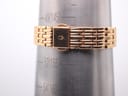 Close-up of the bracelet clasp on a wrist sizing gauge, indicating a wrist circumference of approximately 155mm / 15.5cm.