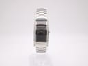 Front view of the Skagen Denmark 459SSXM watch on a white background, showcasing its rectangular stainless steel case with crystal-set sides and black dial.