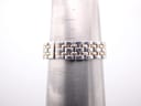 Watch bracelet on a sizing cone, showing wrist fit measurement.