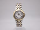 Front view of Raymond Weil Genève 5360 ladies' watch with white dial, Roman numerals, and two-tone bracelet.