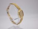 Side view of the Raymond Weil 5707 watch, highlighting the integrated woven bracelet and slim profile.
