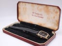 The Bulova SL200 watch presented in an open H Samuel presentation box, showing the watch nestled on black velvet.