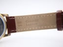 Close-up of the underside of the strap, showing "Genuine Leather" and "18" lug width marking.