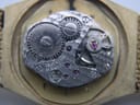 Close-up view of the Tissot 17 jewels manual wind mechanical movement inside the case.