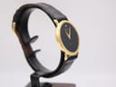 Another angled side view of the Raymond Weil watch, highlighting the profile of the gold case and crown.