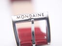 Close-up of the polished stainless steel buckle, engraved with "MONDAINE".
