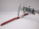 Digital caliper measuring the case diameter of the Mondaine watch, displaying an exact measurement of 30.16mm, confirming the size without crown.
