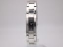 Front view of the Gucci 4600L watch, showing the rectangular black dial and polished stainless steel integrated bracelet.