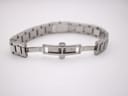Full view of the open butterfly deployment clasp on the stainless steel bracelet.