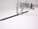 A digital caliper measuring the case diameter of the watch, displaying an exact measurement of 21.93 mm.