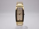 Front view of Marco Ceroni gold-tone rectangular watch with champagne dial and integrated bracelet on a white background.