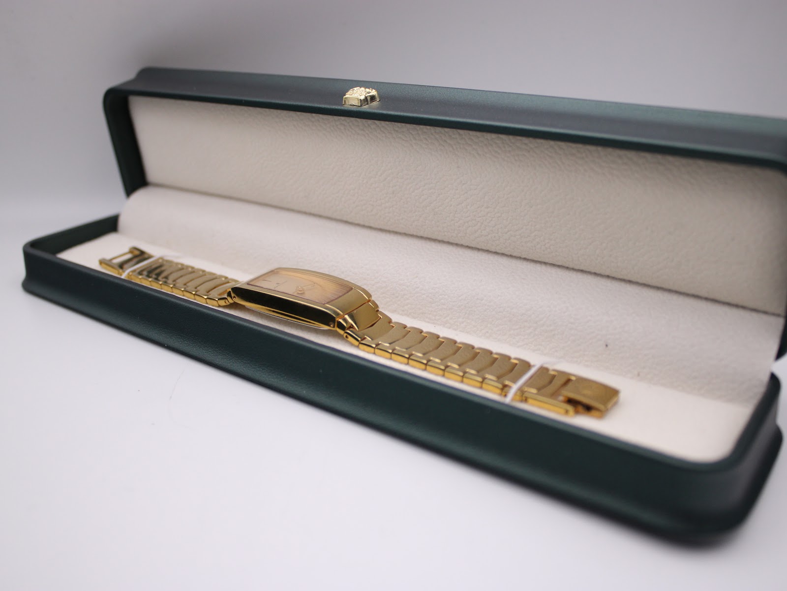 Marco Ceroni watch presented open in a green and cream watch box, showing the full length of the watch.