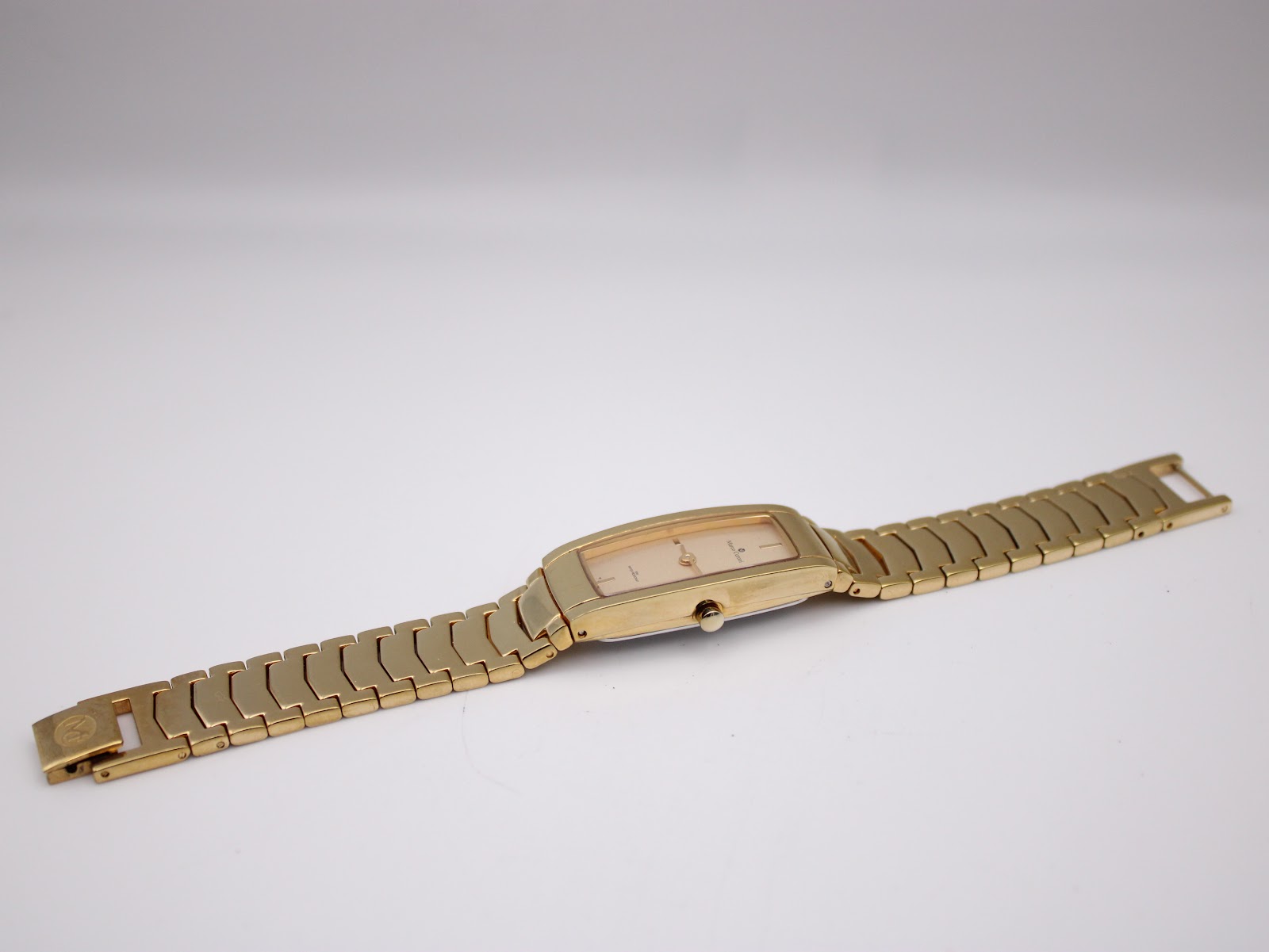 Side view of the Marco Ceroni watch with the bracelet fully extended, showing the watch's overall length and profile.