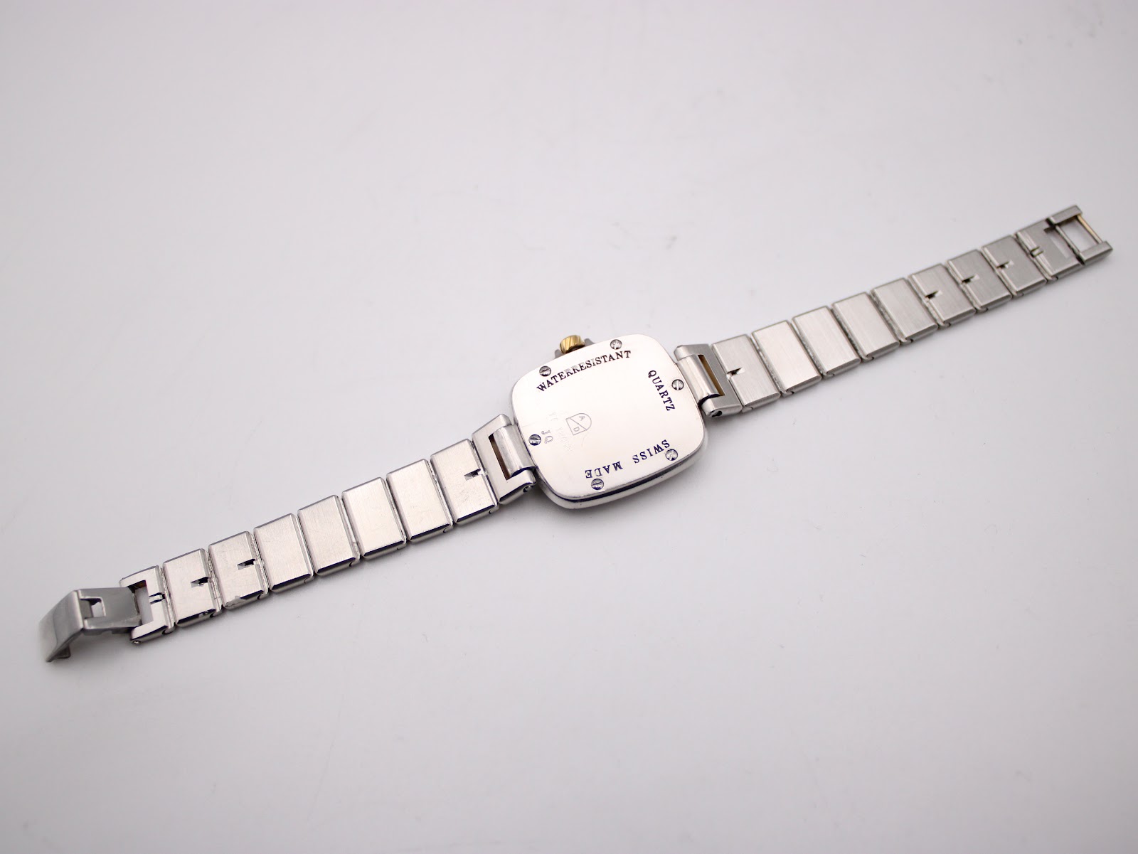 Back view of the Dunhill Millennium watch with its two-tone bracelet extended, showing the clasp.