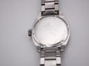 Close-up of the stainless steel case back of the Hugo Boss watch, engraved with "BOSS HUGO BOSS", "WATER RESISTANT 5 ATM / 50 METERS", and "ALL STAINLESS STEEL".