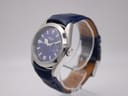 Angled side view of Rotary watch showing polished stainless steel case and crown.