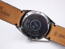 Close-up of the Rotary watch case back showing '100M-PO REF: 10304' engraving and '20 GENUINE LEATHER' on the strap.