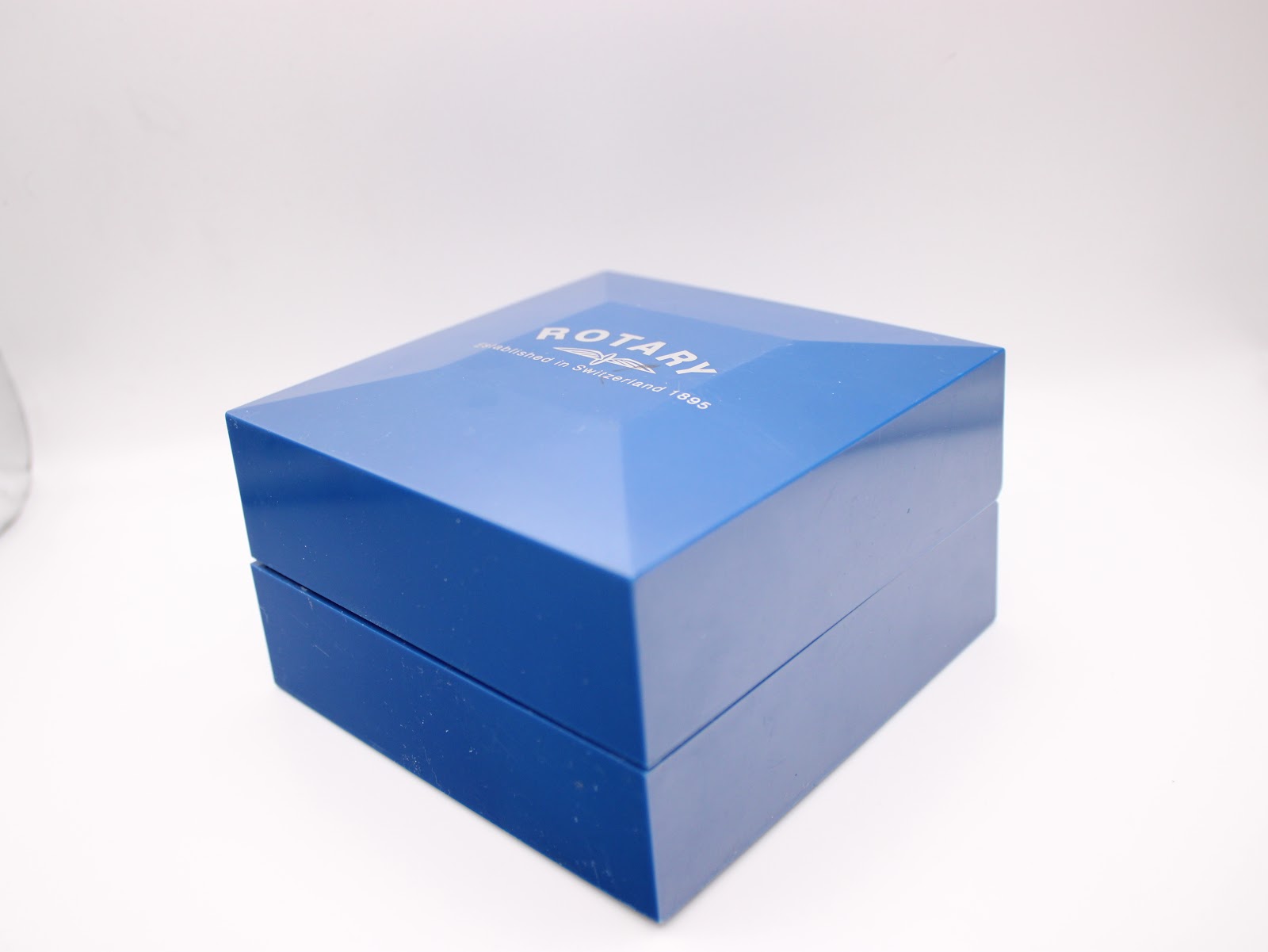 Closed view of the original blue Rotary presentation box with 'ROTARY since 1895' branding.