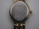 Close-up of the watch case back, showing 'CITIZEN', 'WATER RESIST', 'BASE METAL', '5920-S023871', serial number '597808', and 'MOV'T JAPAN' engravings.