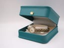 The Citizen watch presented in a generic green display box, highlighting its elegant appearance.