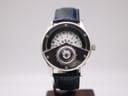 Front view of the Avon dual display compass watch with its white rotating disc dial and central compass.