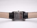 Rear view of the Gucci 2300L case back, engraved with model number, 'swiss made', 'stainless steel', and 'water resistant 3 atm'.