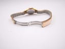 Close-up of the open gold-plated jewellery clasp on the watch's link bracelet.