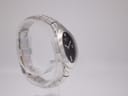 Angled side view of the Tissot L720, showcasing the elegant curve of the case and bracelet.