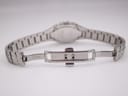 View of the open butterfly deployant clasp on the Tissot L720's stainless steel bracelet, showing "TKM-WA" marking.
