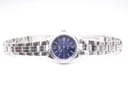 Full front view of the Tissot PR 50 watch with its stainless steel bracelet extended flat.