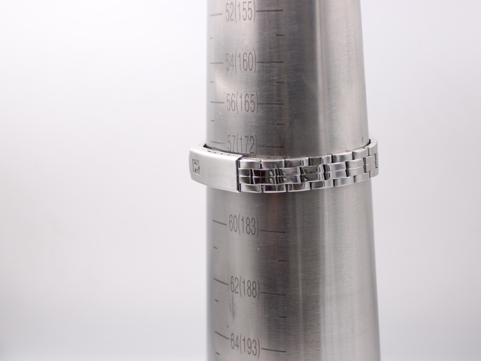 Tissot watch bracelet displayed on a sizing gauge, indicating a wrist circumference of approximately 172mm.