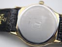 Close-up of the stainless steel case back, showing 'TISSOT', 'F 300', 'SAPPHIRE CRYSTAL', 'WATERRESISTANT 30 M' and the T logo.