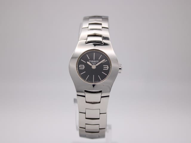 TISSOT L520 — photo 1