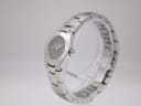 Angled side view of Tissot T-Trend watch showing the polished stainless steel case and integrated bracelet.