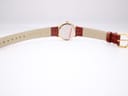 Back view of the watch and strap, showing the underside of the brown leather strap with 'Croco Grain' and '14' marking.