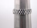Close-up of the stainless steel bracelet on a wrist sizing gauge, indicating a wrist circumference of approximately 16.5cm (165mm).