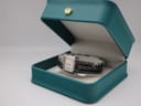 The Tissot T-Trend watch presented inside a green, non-original display box.